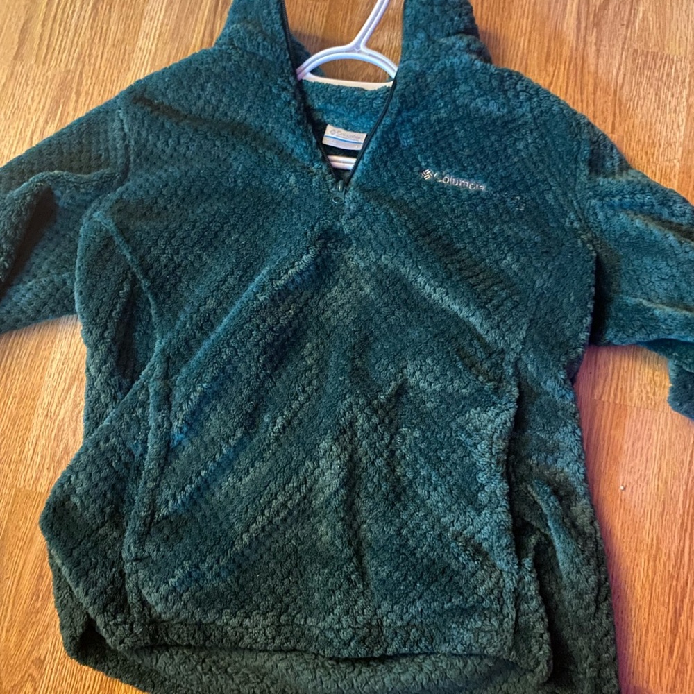 Hello! This is a Colombian sweater that’s a lovely green blue color!